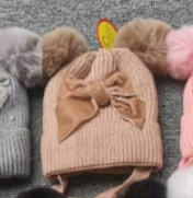 Hat with pompon for a girl beige