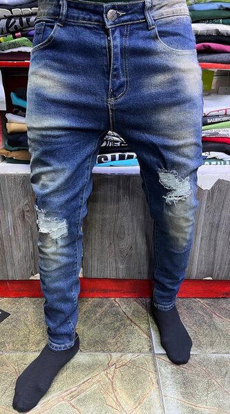 Jeans déchirés homme