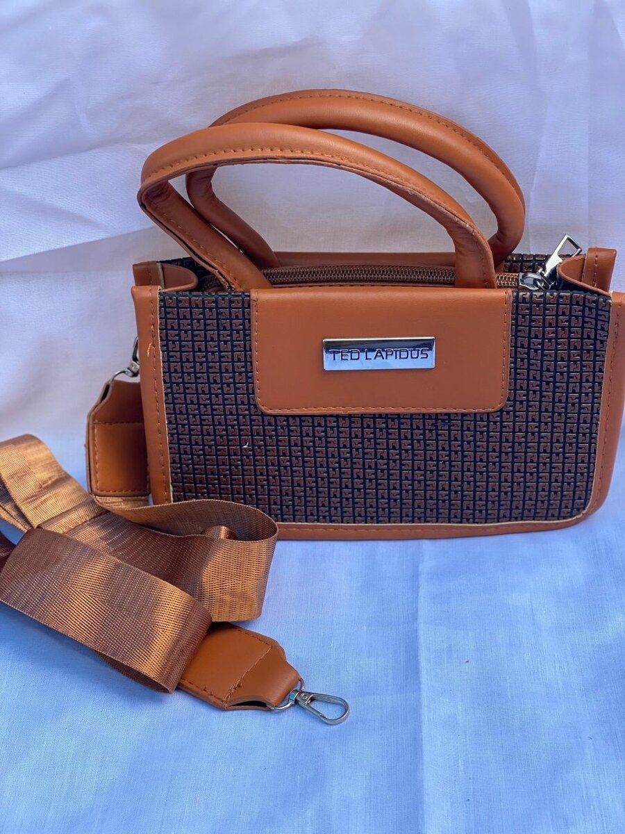 Sac élégant en cuir bicolore