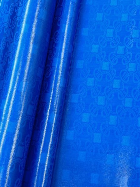 Tissu bleu avec motif géométrique