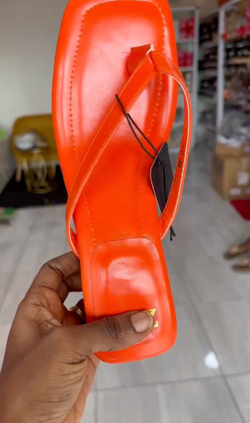 Leather orange flip flops with heels