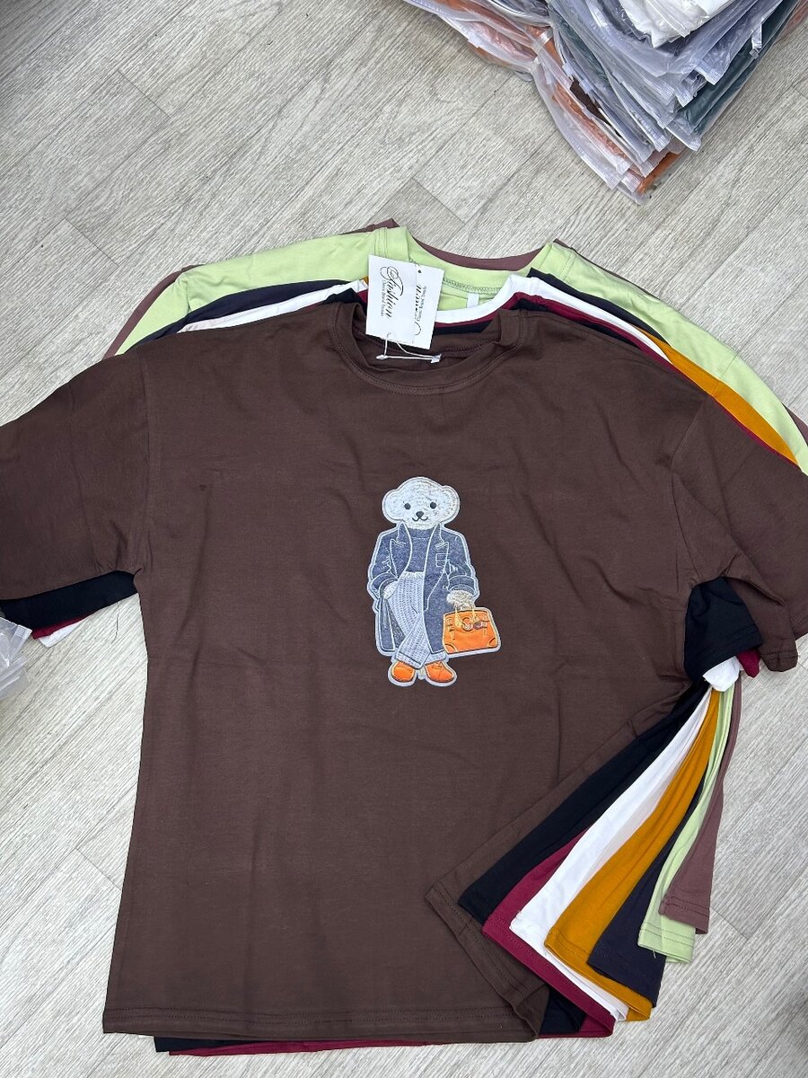 Футболки женские