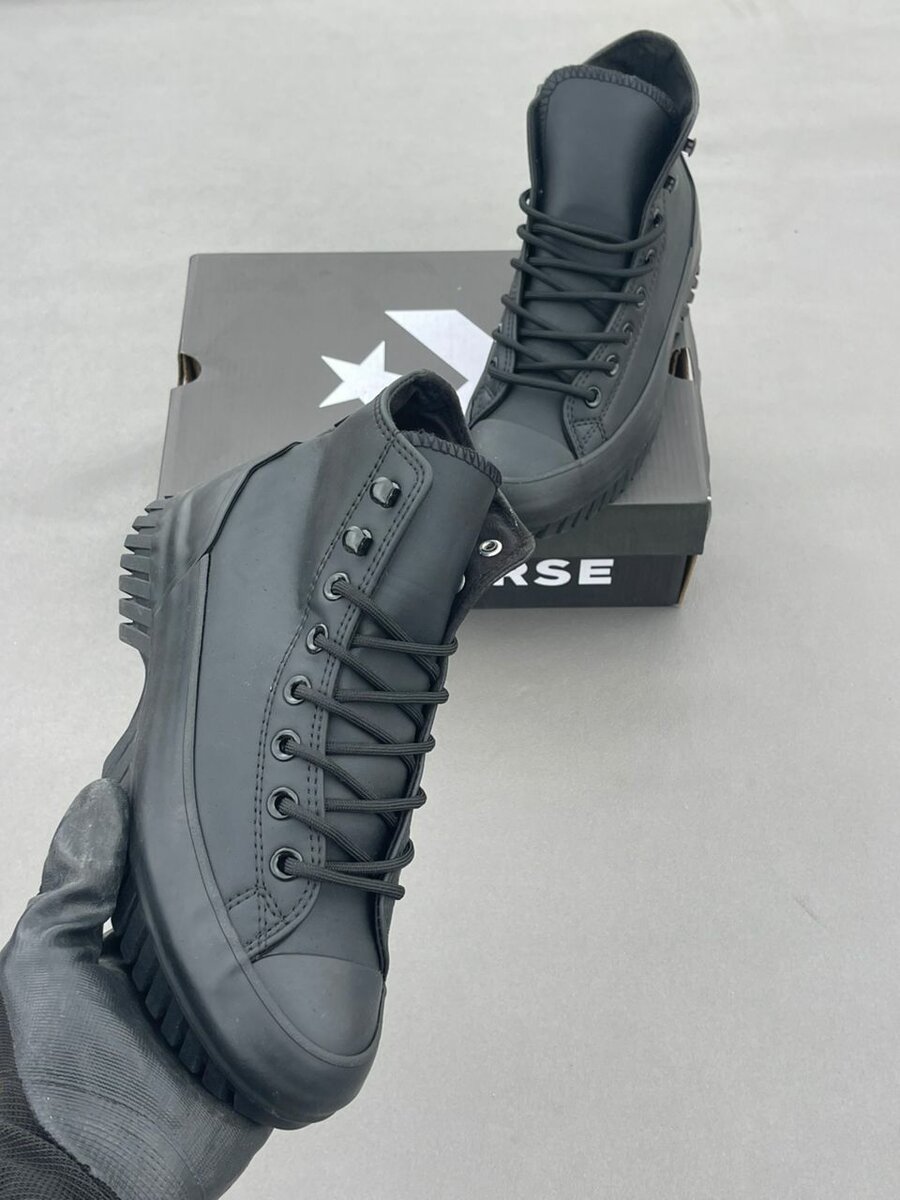 Baskets noires Converse montantes