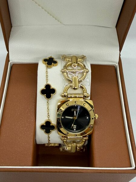 Montre Gucci en or avec bracelet en cuir - Élégance et Luxe