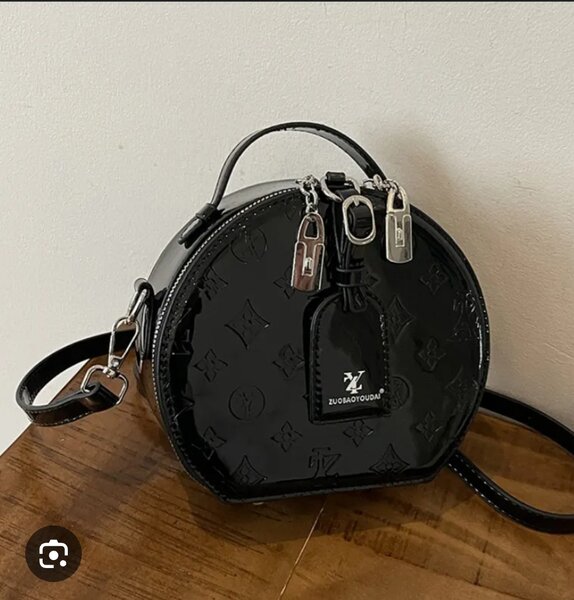 Sac bandoulière rond élégant