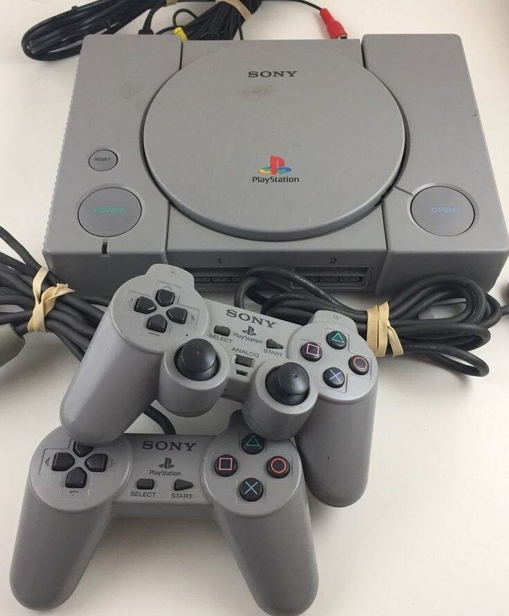 Console Sony PlayStation PS1 grise avec manette