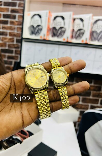  Two boxed couple watches 