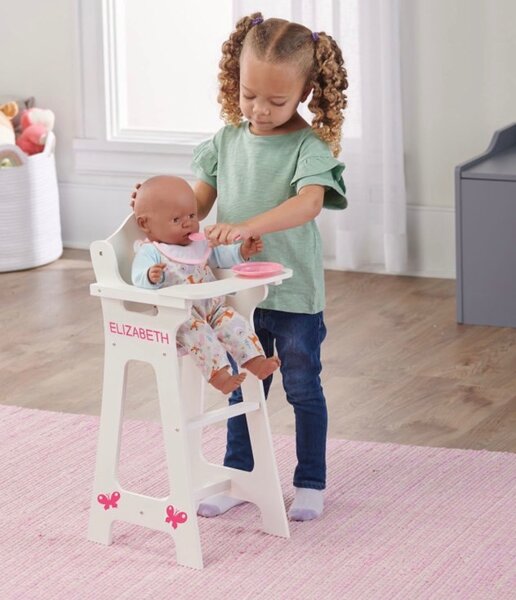 Doll in a highchair