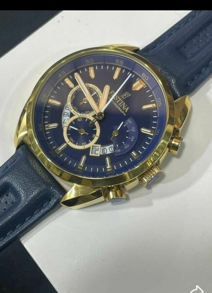 Montre homme en cuir bleu avec cadran doré