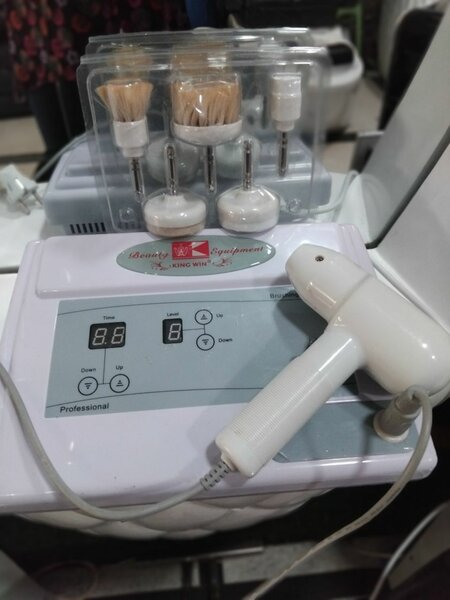 Nail drill, piercing gun,  facial brush