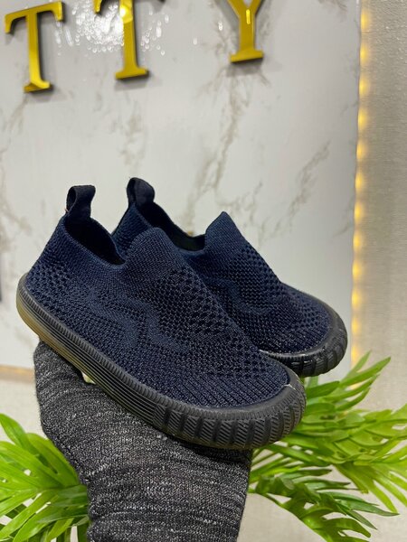 Navy blue sneakers
