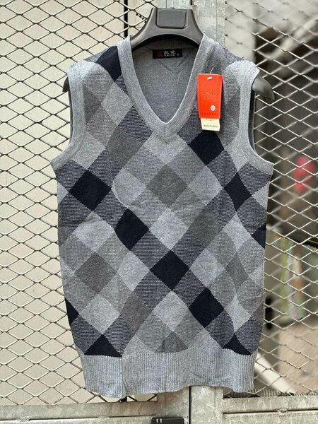 Pull sans manches à carreaux