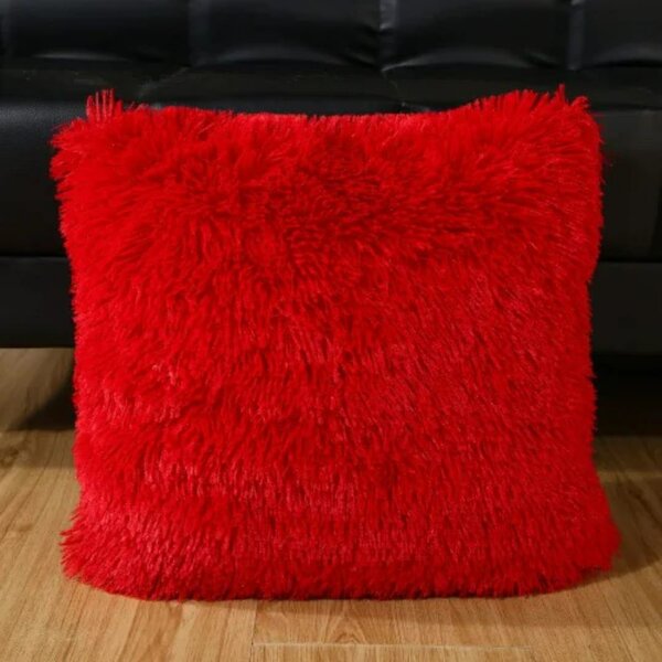 Coussin peluche rouge doux