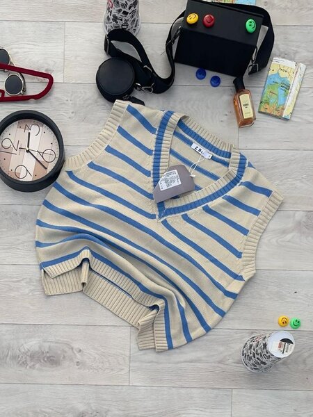 Pull sans manches rayé chic