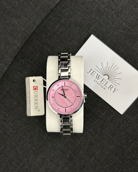 Curren silver pink face