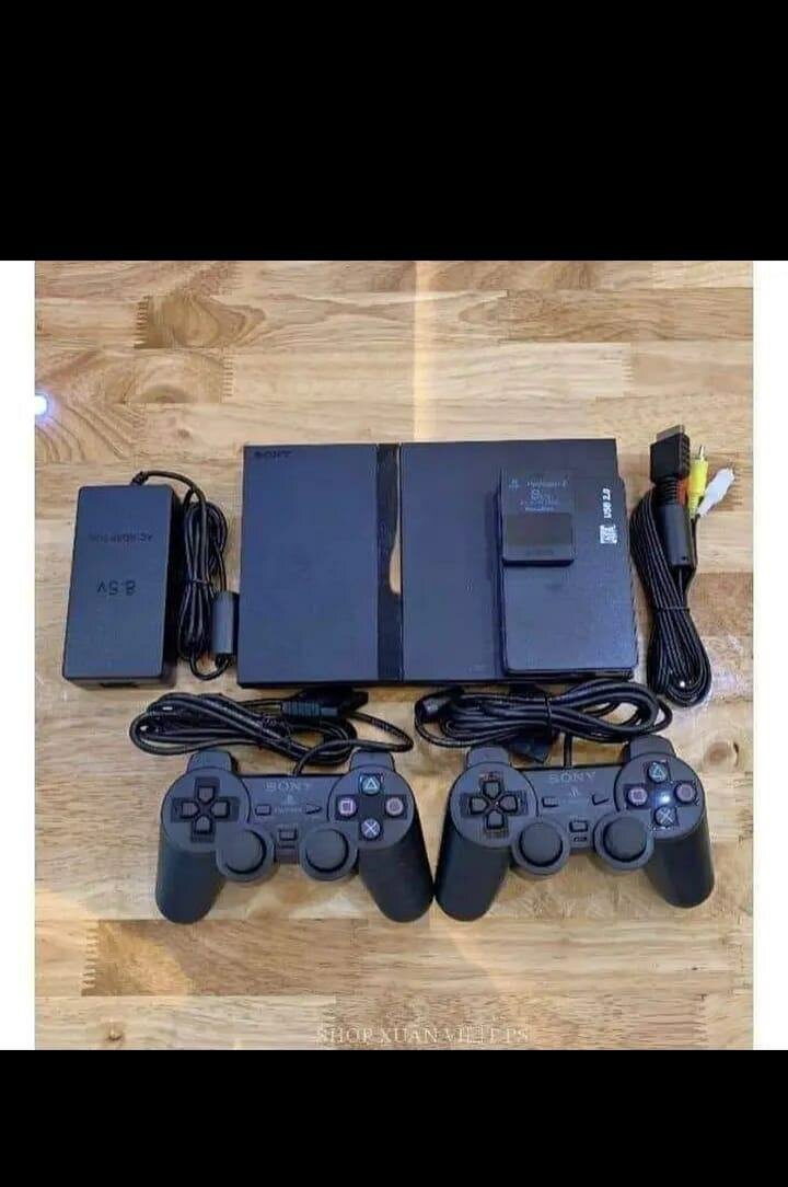 Console PS2 slim avec accessoires