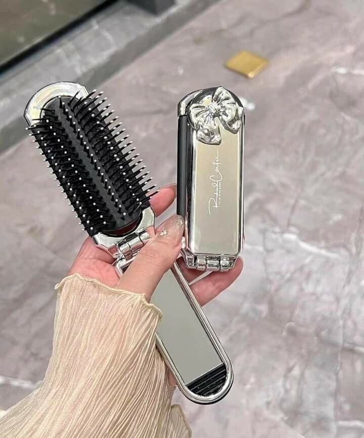 Brosse à cheveux pliante avec miroir