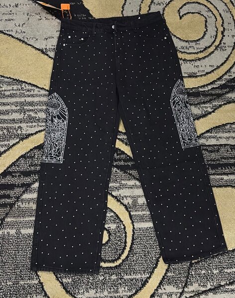 Pantalon noir à motifs