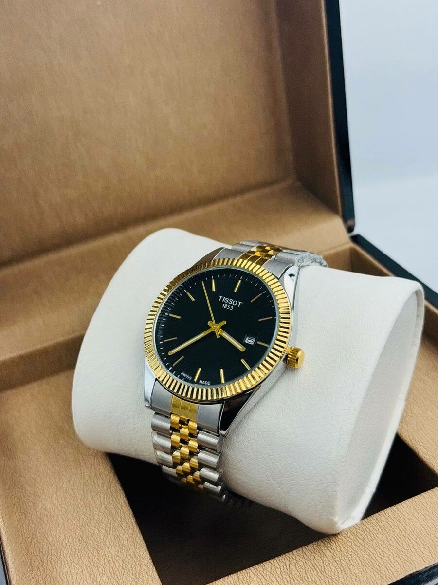 Montre en acier inoxydable dorée