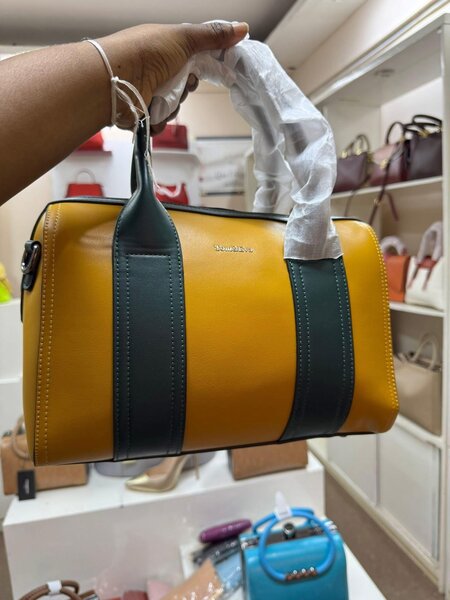 Sac de voyage en cuir jaune et vert