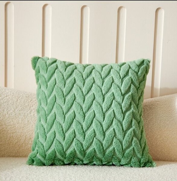 Coussin vert tricoté doux