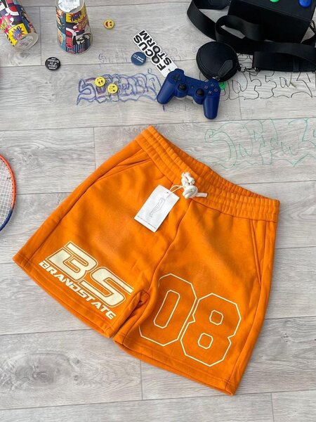 Shorts orange sport hommes