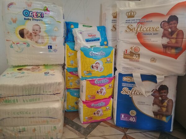Softcare wipes and diaper, cuettie diaper and orexi baby dia