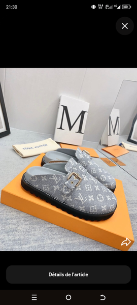 Mules Louis Vuitton en cuir noir