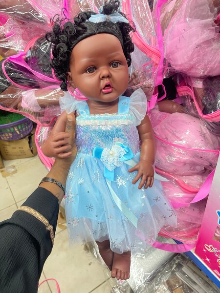 Poupée Bébé en Robe Bleue