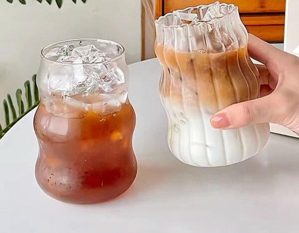 Wavy glass jar with glass straw