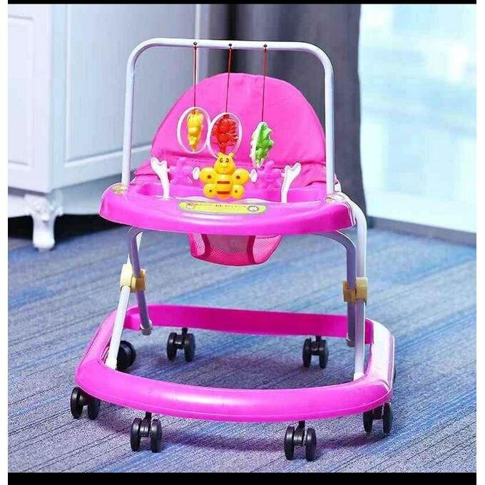Trotteur bébé rose avec jouets