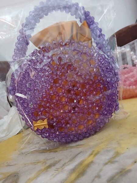 Sac rond perles élégant