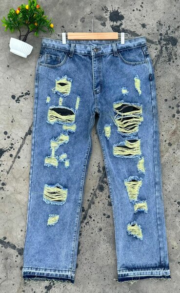 Jeans déchirés tendance unisexe