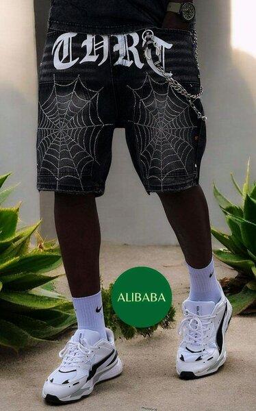 Shorts en jean motif araignée