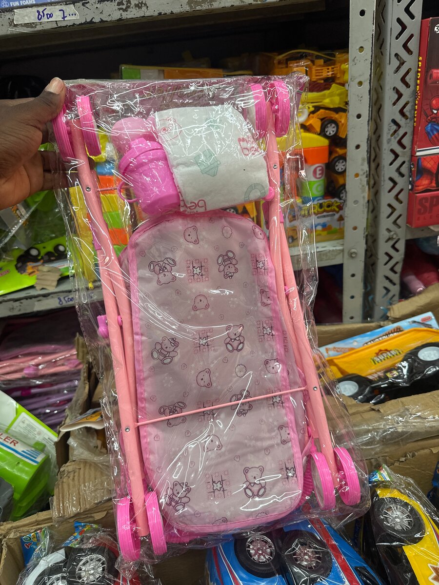 Poussette jouet rose pour poupée