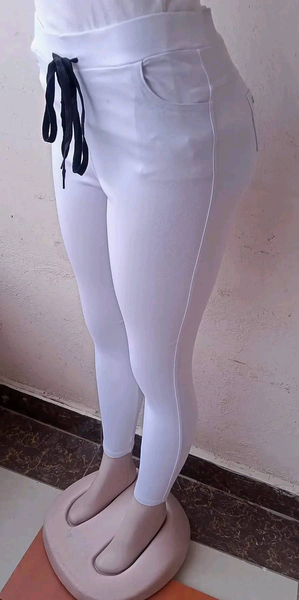 white tight-fitting lace-up leggings