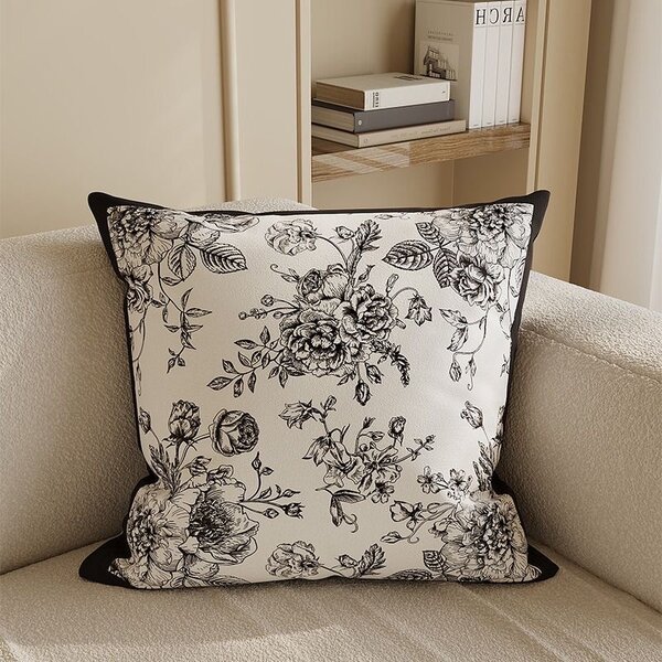 Coussin à fleurs en noir et blanc