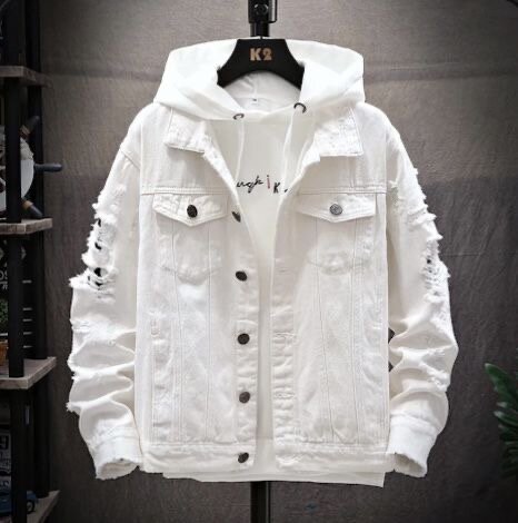 Veste en jean blanche déchirée