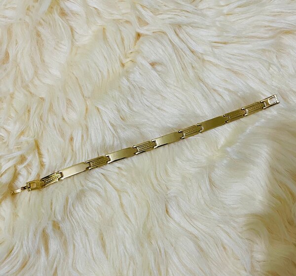 Bracelet en acier doré