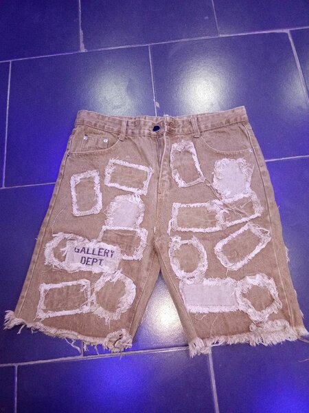 Shorts en jean déchiré unisexe