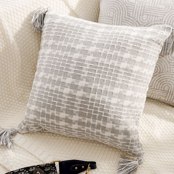 Coussin à Pompons Élégant