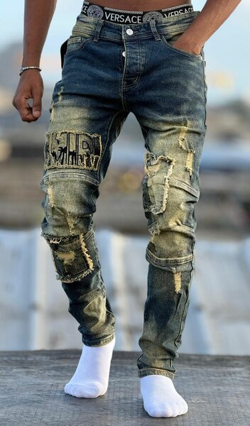 Jeans déchirés homme tendance
