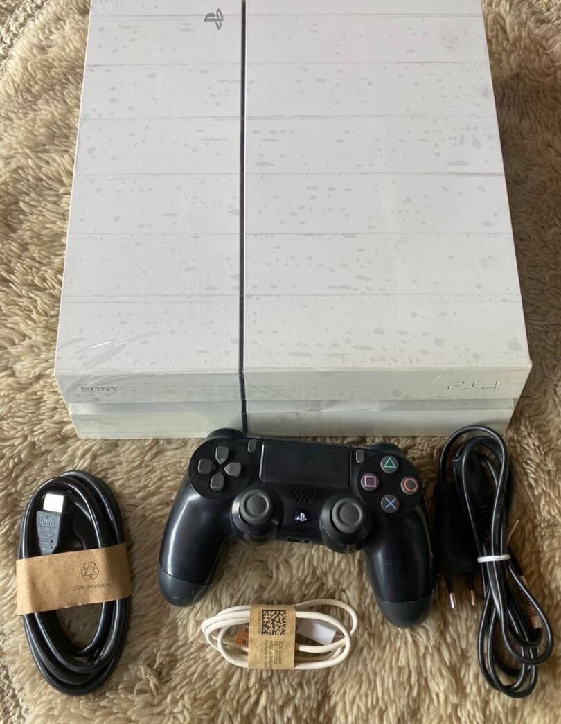 PS4 occasion craqué +10 jeux installés et une manette  -