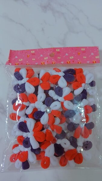 Lot de fleurs en tissu colorées