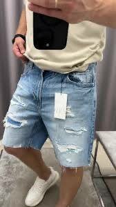 Shorts en jean déchirés homme