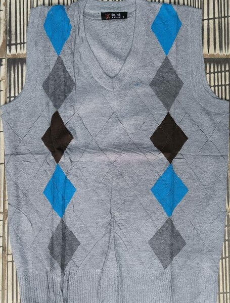 Pull sans manches à carreaux