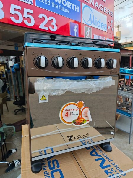 Mini cuisinière yucell 4 feux avec four neuf