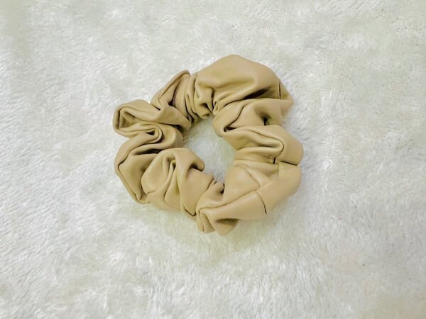 Beige color leather hIr scrunchie for girls.