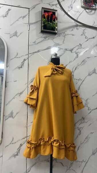 Ready to wear ladies dresses and trousers/top