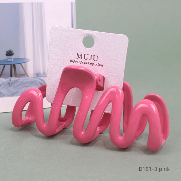 Rolled and comb clip